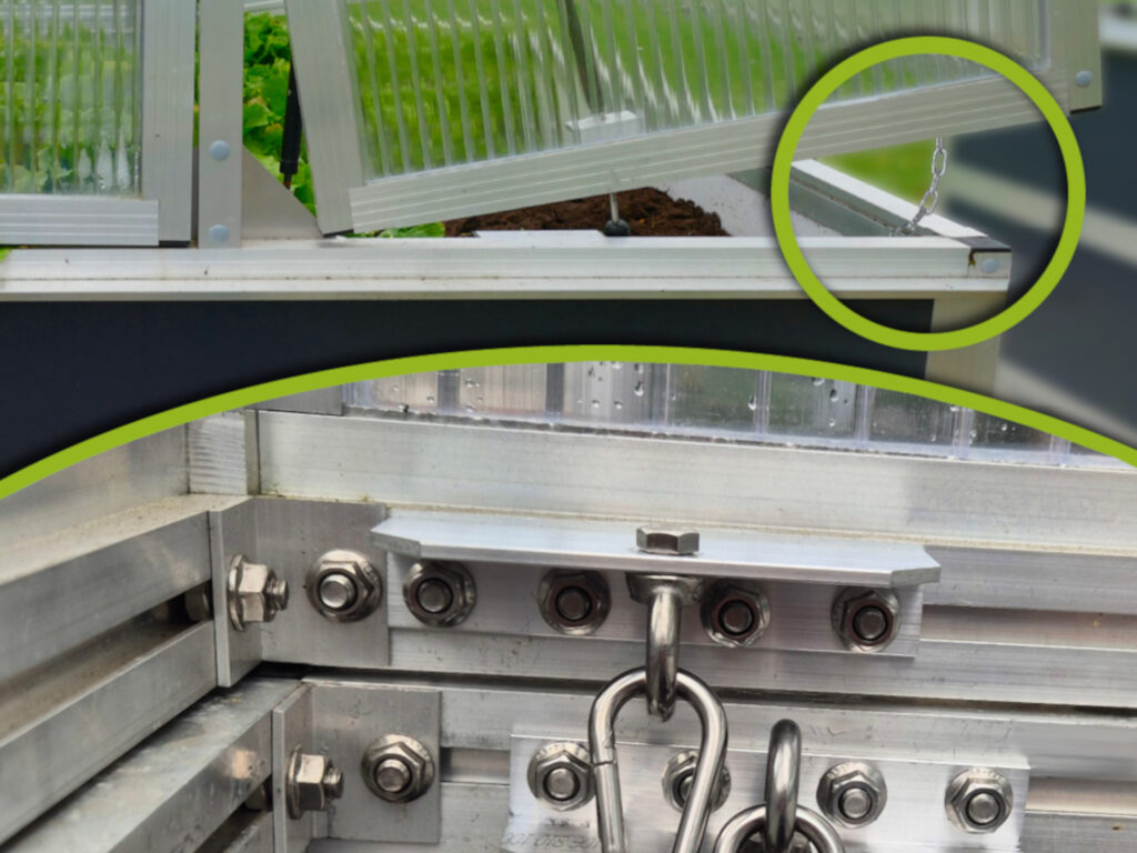 Detailansicht der Sturmsicherung am WAMA Hochbeet mit Ketten- und Winkelverbindung zur Sicherung des Deckels bei Wind